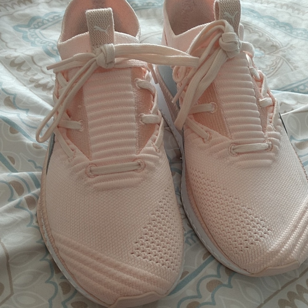 Pink and gray Pumas